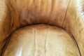 Detail of an old brown leather chair, Leather chair close-up. Leather texture material background Royalty Free Stock Photo