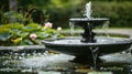 Detail of an old classic style stone fountain with flowing water. Royalty Free Stock Photo