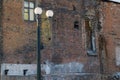 Detail of an old crumbling red brick building close-up