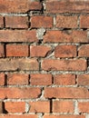 Detail of old exposed red brick wall Royalty Free Stock Photo