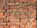 Detail of old exposed red brick wall Royalty Free Stock Photo