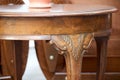 Detail of a old fashionned rounded table Royalty Free Stock Photo