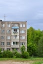 Detail of old five-story building on the outskirts in a residential area. Cheap accommodation built during the Khrushchev and Brez