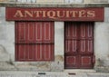 Old French shuttered store front in red Royalty Free Stock Photo