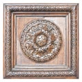 Detail of an old italian wooden carved frame with floral decorations