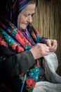 Detail of an old lady knitting