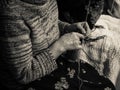 Detail of an old lady knitting Royalty Free Stock Photo