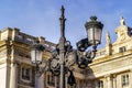 Detail of old lamppost of the royal palace of Madrid Royalty Free Stock Photo