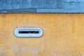Detail of an old letterbox on a brick wall, vintage marble built-in mailbox, Italy, Europe Royalty Free Stock Photo