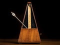 Detail of an old mechanic musical metronome