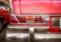 Detail of old mythic german car, close up of rear light and red sheet metal