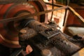 Detail on old rusty motor mechanism, rotor moving, metal axis co