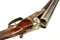 Detail of old shotgun on white. Royalty Free Stock Photo
