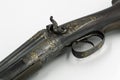 Detail of old shotgun on white background Royalty Free Stock Photo