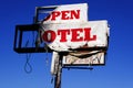 Old Torn and Worn or Weathered Motel Sign and Blue Sky Vintage