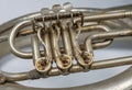 Detail of old vintage rusty French horn Royalty Free Stock Photo