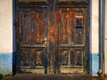 Detail of old weathered wooden door entrance Royalty Free Stock Photo