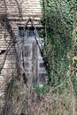 Detail of old window on brick wall Royalty Free Stock Photo