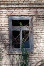 Detail of old window without glass on brick wall Royalty Free Stock Photo