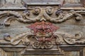 Detail of old wooden door with a knocker Catholic monastery. Royalty Free Stock Photo