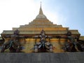 The giants monkey statue under golden stupa in Bangkok Royalty Free Stock Photo