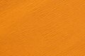 Detail of an orange crepe paper crinkly texture Royalty Free Stock Photo