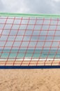 Detail of an orange volley ball net at the seaside Royalty Free Stock Photo