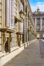 Detail of the outer courtyard of the royal palace of Madrid, with lampposts, arches and neoclassical style