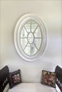 Detail of oval window in home Royalty Free Stock Photo
