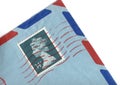 Detail of a 34p postage stamp on an air mail envelope.