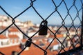 Detail of padlocks placed on the security fence of the Santa Just lift in Lisbon