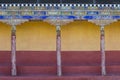 Detail of painted wall in Thiksey Buddhist Monastery near mountain village Leh in ladakh, India Royalty Free Stock Photo