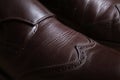 Detail of a pair of brown leather classic Brogue shoes