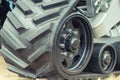 Detail and part of metal wheel with caterpillar. Transportation Royalty Free Stock Photo