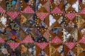 Detail patchwork quilt in market. Bali island, Ubud, Indonesia. Closeup patchwork blanket texture Royalty Free Stock Photo