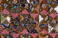 Detail patchwork quilt in market. Bali island, Ubud, Indonesia. Closeup patchwork blanket texture Royalty Free Stock Photo