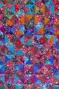 Detail patchwork quilt in street market. Bali , Indonesia. Close up patchwork blanket texture Royalty Free Stock Photo