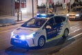 patrol car of the Guardia Urbana police in Barcelona,it is night and it is with the patrol lights on Royalty Free Stock Photo