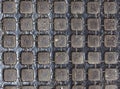 Detail of the pattern from a manhole cover. Royalty Free Stock Photo