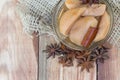 Detail on a Pear Compote on Wooden Table with Star Anise