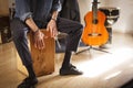 Flamenco drumbox being played by percussionist.