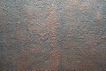 Detail of perforated copper metal sheet. Copper checker board with black holes. Rusty old perforated metal plate material surface