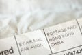 Detail photo - address on package envelope of stuff ordered from Chinese eshop. Shopping from online retailers in Asia Royalty Free Stock Photo