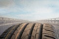 Detail photo of a car tire on a road Royalty Free Stock Photo