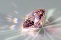 Detail photo focus stacking of a self-cut Cubic Zirconia with Pink color and Standard Round Brilliant cut, placed on a white acr