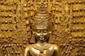 detail photo of a gold ornamental religious artifact