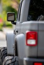 Detail photo of a tough off road vehicle with oversized big tires Royalty Free Stock Photo