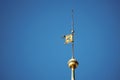 Detail of the copper tower of the town hall in the Pardubice town of Czech Republic with golden flag with horse Royalty Free Stock Photo
