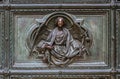 Detail of the Pieta scene in bas-relief at Milan`s Cathedral doors Royalty Free Stock Photo