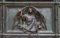 Detail of the Pieta scene in bas-relief at Milan`s Cathedral doors Royalty Free Stock Photo